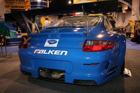 Blue Falken Porsche 911 race car rear view with large wing