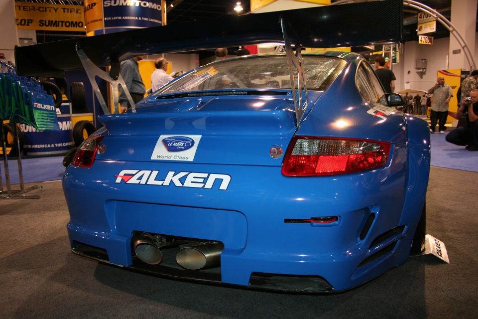 Blue Falken Porsche 911 race car rear view with large wing