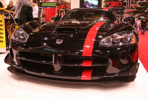 Black Dodge Viper with red stripe close front view at show