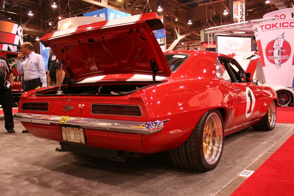 Red number 1 race-livery Camaro rear view at trade show