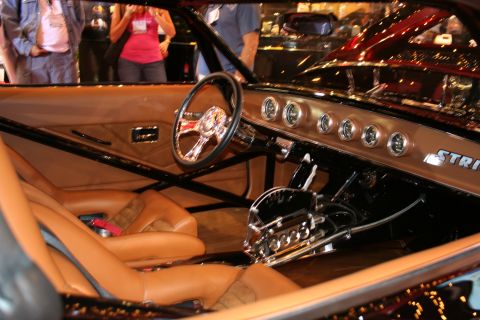 Custom hot rod interior with tan leather and chrome steering column