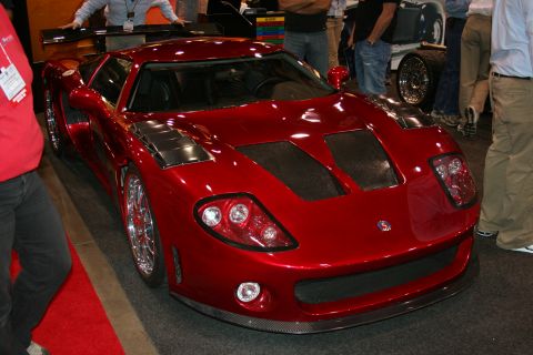 Dark red Factory Five GTM supercar, front three-quarter view