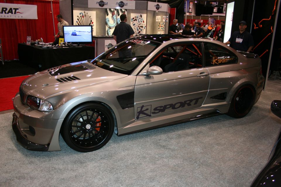 Silver widebody K-Sport BMW E46 M3, side profile at a show