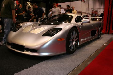 Silver sports car with aggressive styling and a large rear wing