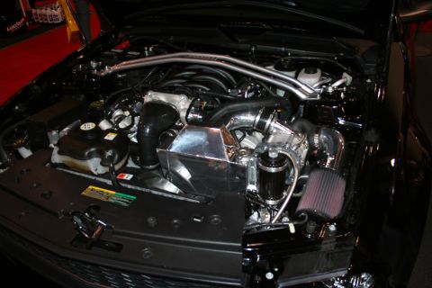 Engine bay with aftermarket turbocharger and intake