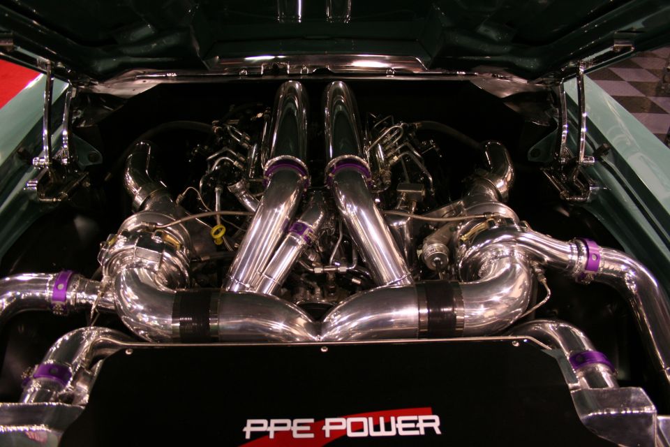 Engine bay with polished twin turbochargers and purple accents, showing 'PPE POWER' text