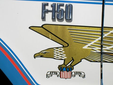 1976 Ford F-150 - Close-up of an F150 emblem an eagle and bicentennial dates.