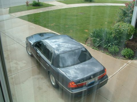 1999 Mercury Grand Marquis - This sedan has a '4.6' badge on the rear, indicating a 2003 model year.