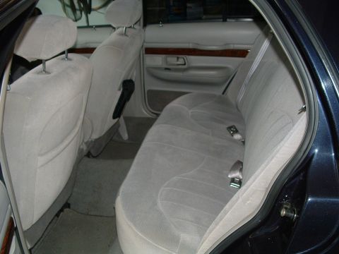 1999 Mercury Grand Marquis - Interior view of the rear seating area in a 1999 Mercury Grand Marquis.