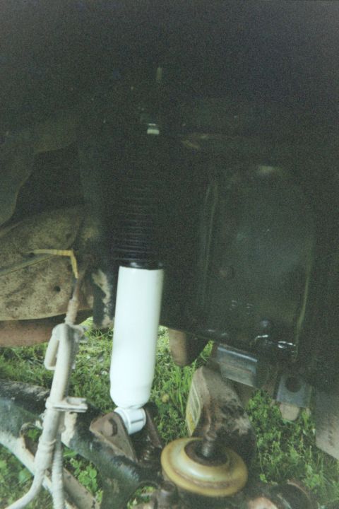 1995 Ford Bronco - New shock w/stock 18mm nut and bolt on the bottom and 9/16" nut on top. Just a note, do not do as I did in this picture...do not attach the…