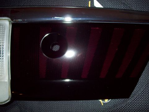 1999 Mercury Grand Marquis - A close-up shows the detail of a tinted tail light assembly, likely a replacement part.