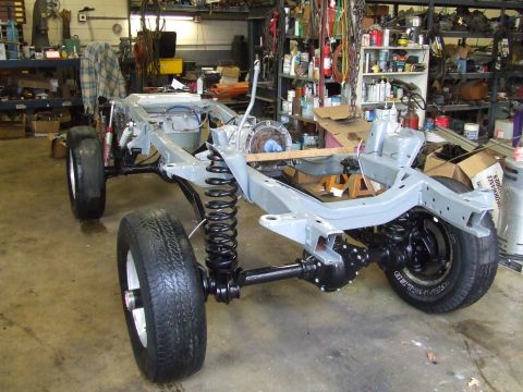 1967 Ford Bronco - This image shows the frame and suspension of a vehicle, likely undergoing restoration or repair.