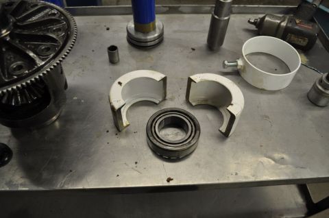 1996 Ford Bronco - Tools for differential and bearing service laid out on a workbench.