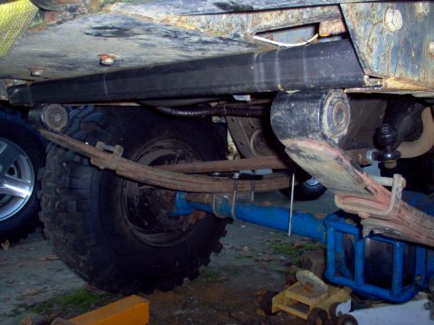 1986 Ford Bronco - Here's the spring packs setting against the square tube. Looks pretty good so far.
