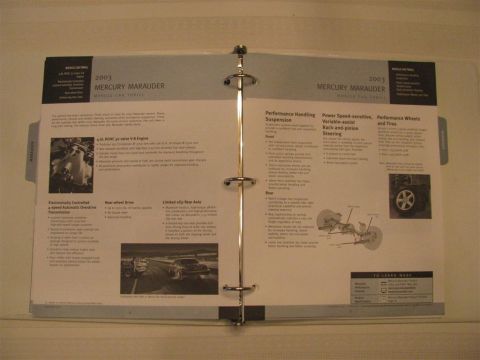 2003 Mercury Marauder - Brochure page detailing the 2003 Mercury Marauder's engine, drivetrain, and performance features.