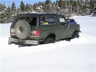 1979 Ford Bronco - Ford Bronco stuck in snow during a winter outing.