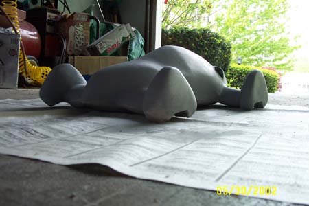 1966 Ford Five Hundred - Primer is sprayed on and sanded off to determine where the low spots on the model are. Bondo can then be applied, or the trouble area sande…