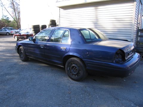1991 Ford LTD Crown Victoria - This 1991 Ford Crown Victoria LTD is seen from the rear, with its taillights removed.
