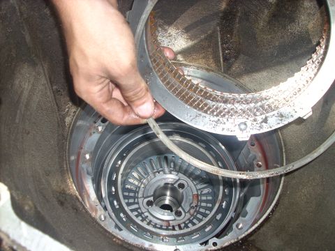 1992 Ford Bronco - remove the snap ring from the case and remove the overdrive pressure plate and clutches
