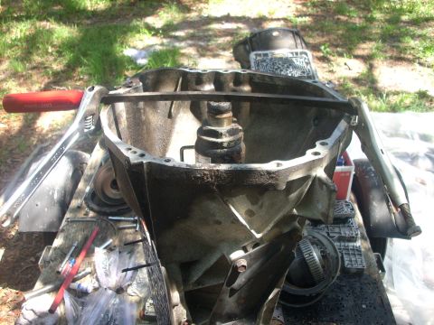 1992 Ford Bronco - here i used a bottle jack, pry bar, vice grips, and 1X1 peice of wood just large enough to fit on the metal inside............next put some…