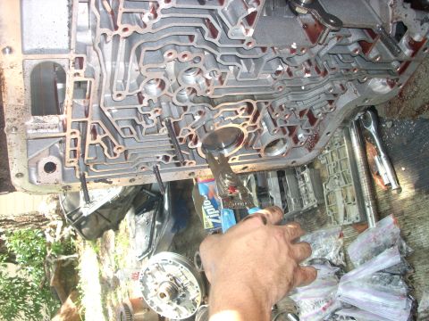 1992 Ford Bronco - then you can remove the OD servo, snap ring, and cover BE CAREFULL! it will fly out of there if you are not holding pressure on it