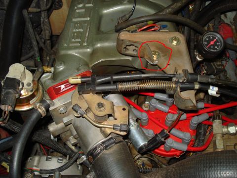 1987 Ford Bronco - Close-up view of engine components, including the intake manifold and distributor.