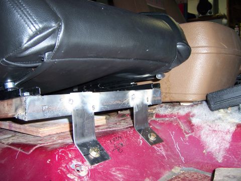 1991 Ford Bronco - Custom seat brackets are attached to the vehicle's floor pan.