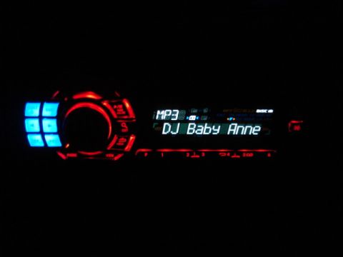 1979 Chevrolet C/K Pickup - Aftermarket car stereo with MP3 playback and a customizable display showing "DJ Baby Anne".