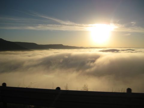 1996 Ford Bronco - A breathtaking view of clouds stretching to the horizon under a bright sun.