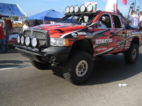 1996 Ford Bronco - This modified Dodge Ram is equipped for off-road racing with numerous lights and sponsor decals.