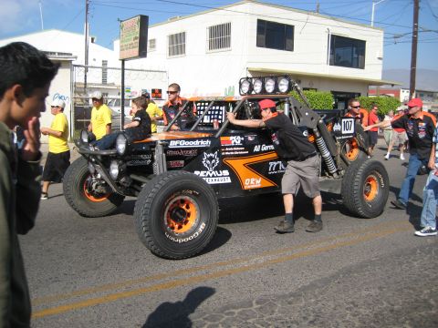 1996 Ford Bronco - A custom off-road buggy, possibly a trophy truck, is seen with racing decals and a prominent number 107.