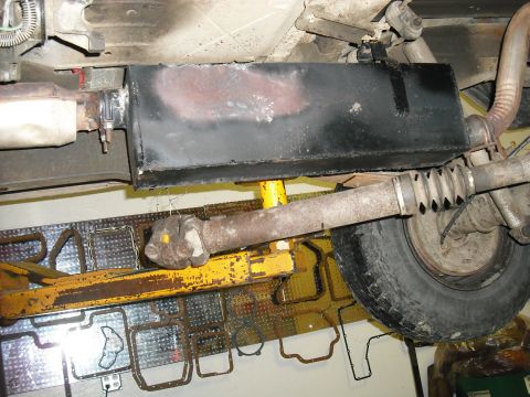 1988 Ford Bronco - unbolt the driveshafts and put them out of the way since its not comming of the lift