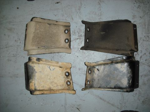 1988 Ford Bronco - on top the original crossmember braces and below the new ones