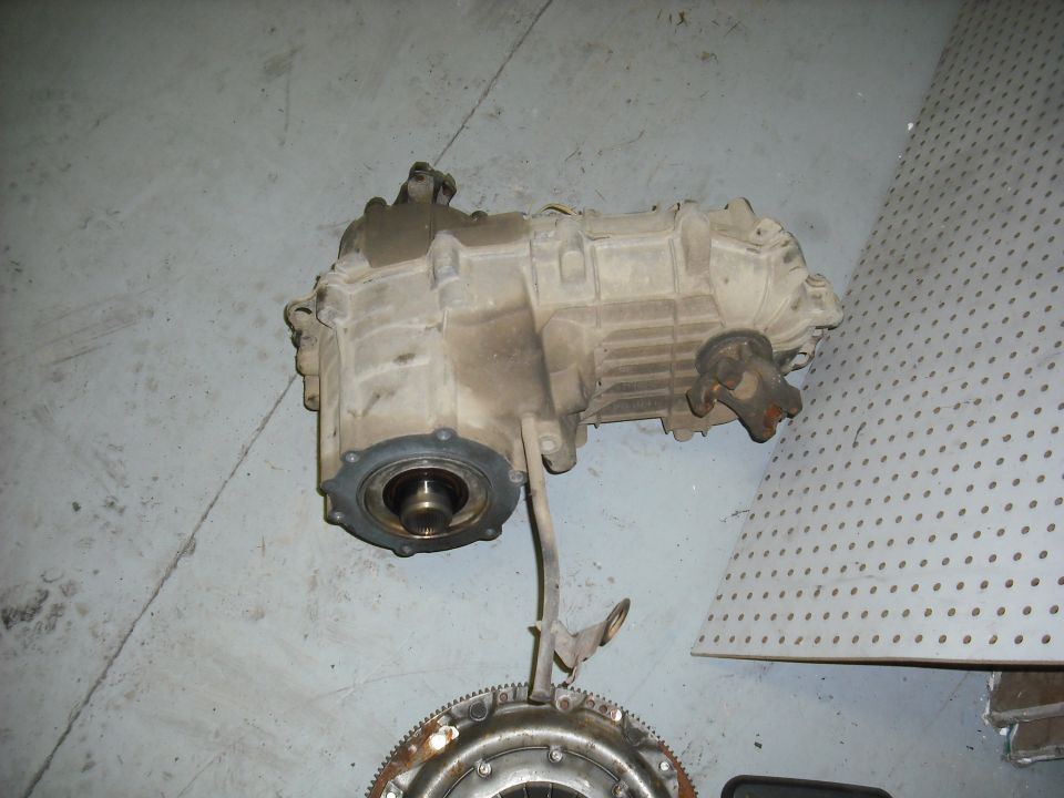 unbolt the t-case and set it aside