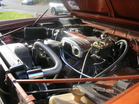 1972 Ford Bronco - Close-up view of the engine bay, showing various components and wiring.