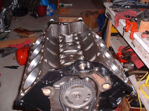 1983 Ford Bronco - Close-up view of an engine block, showing internal components and a timing chain mechanism.