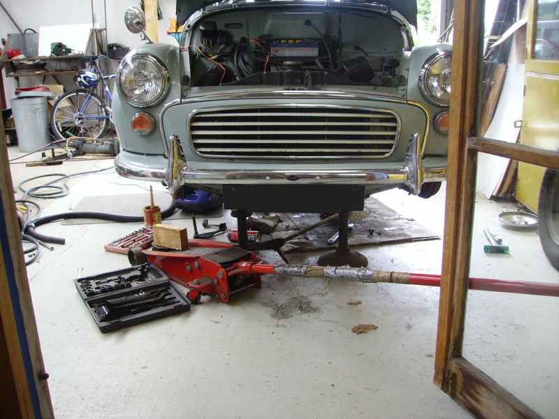 Morris Minor front end on jack stands, light blue