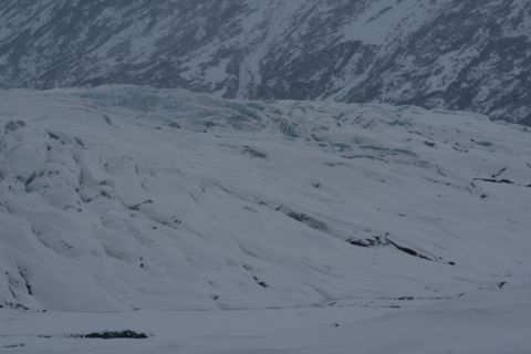 1990 Chevrolet Suburban - Expansive view of a glacier in a mountainous, snow-covered landscape.