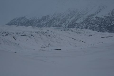 1990 Chevrolet Suburban - A vast, snow-covered landscape with a prominent glacier and distant mountains.