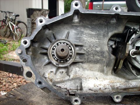 1992 Ford Bronco - Close-up of a transfer case housing, showing internal components and a bearing.
