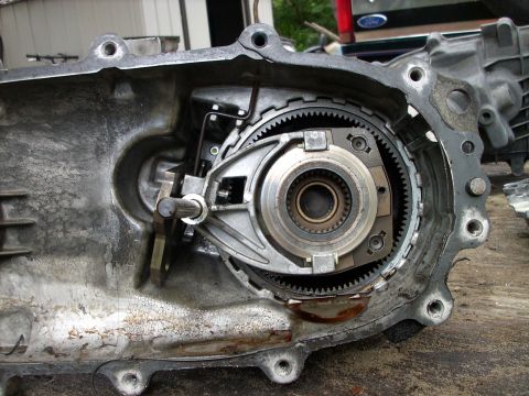 1992 Ford Bronco - The internal components of a vehicle's transfer case are shown, including gears and the housing.