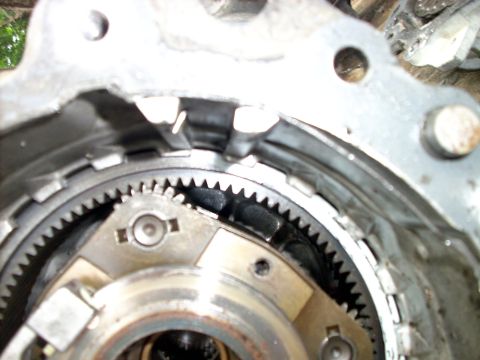 1992 Ford Bronco - Internal view of a vehicle's transfer case, revealing gears and housing components.