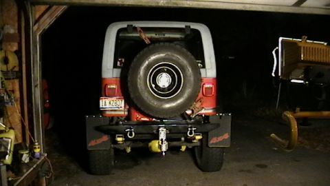 1989 Jeep YJ - Rear view of a 1989 Jeep YJ with a spare tire mounted on a swing away bumper.