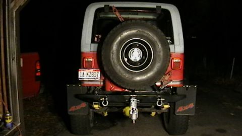1989 Jeep YJ - This Jeep features a swing-away tire carrier and a custom rear bumper with tow hooks.
