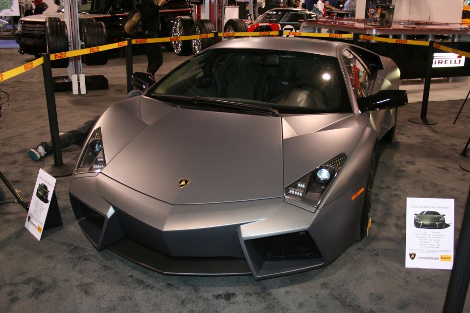 Matte gray Lamborghini Reventon on display indoors