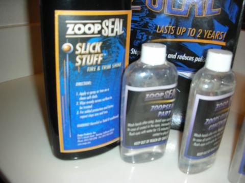 1998 Ford Crown Victoria - Several bottles of ZoopSeal car cleaning products are displayed on a white surface.