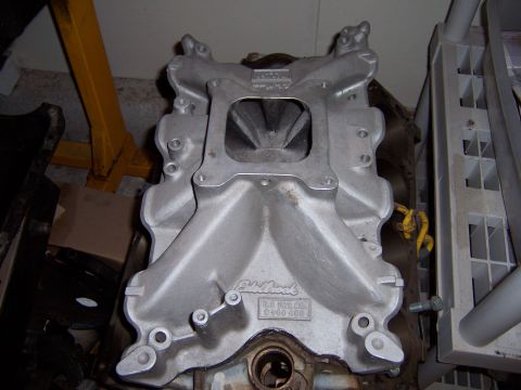 1971 Ford Mustang - Edelbrock intake manifold, part number 60000, shown in a workshop setting.