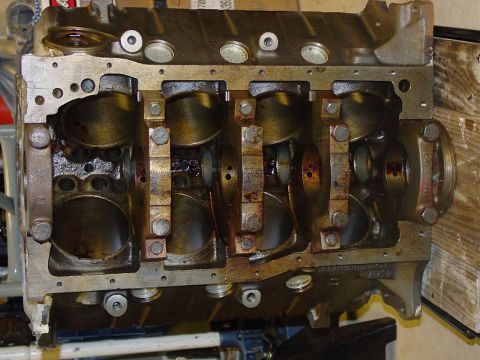 1971 Ford Mustang - Engine block with crankshaft and connecting rods. Casting numbers visible on the block.