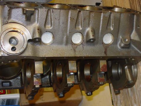 1971 Ford Mustang - Close-up view of an engine block, showing the oil filter housing and main bearing caps.