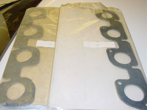 1971 Ford Mustang - Exhaust manifold gaskets are shown in their packaging, ready for installation.